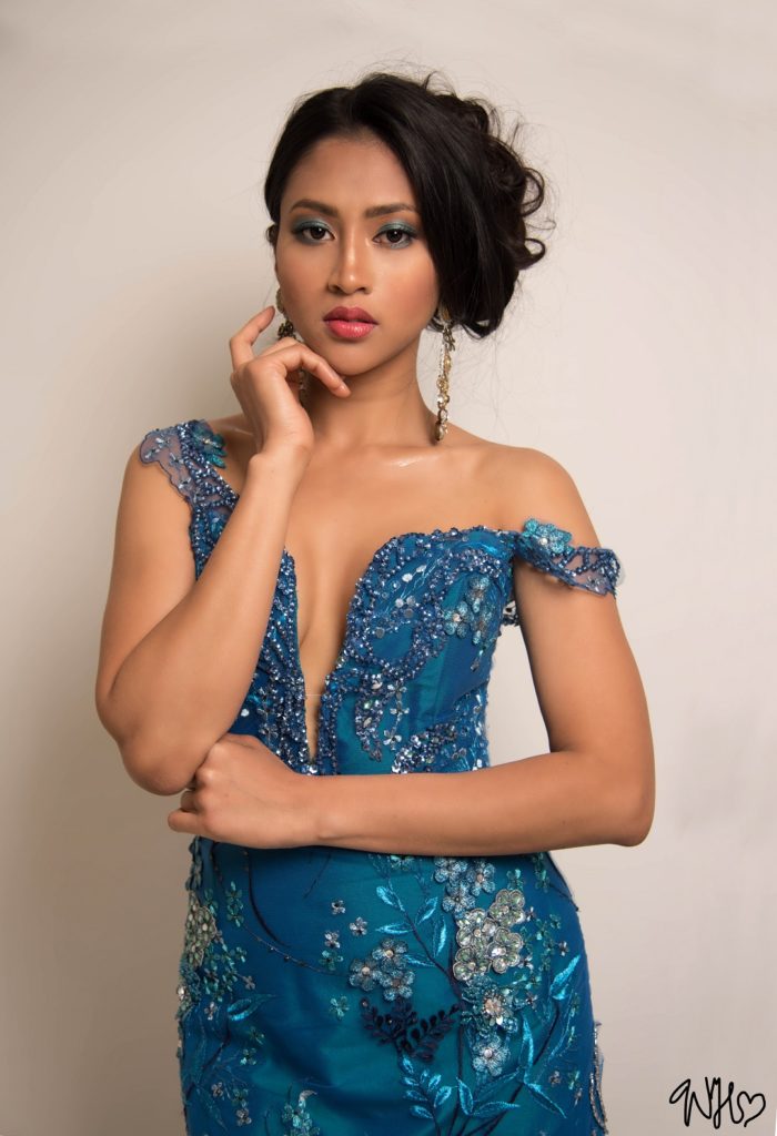 Asian model wearing blue dress and blue eyehadow